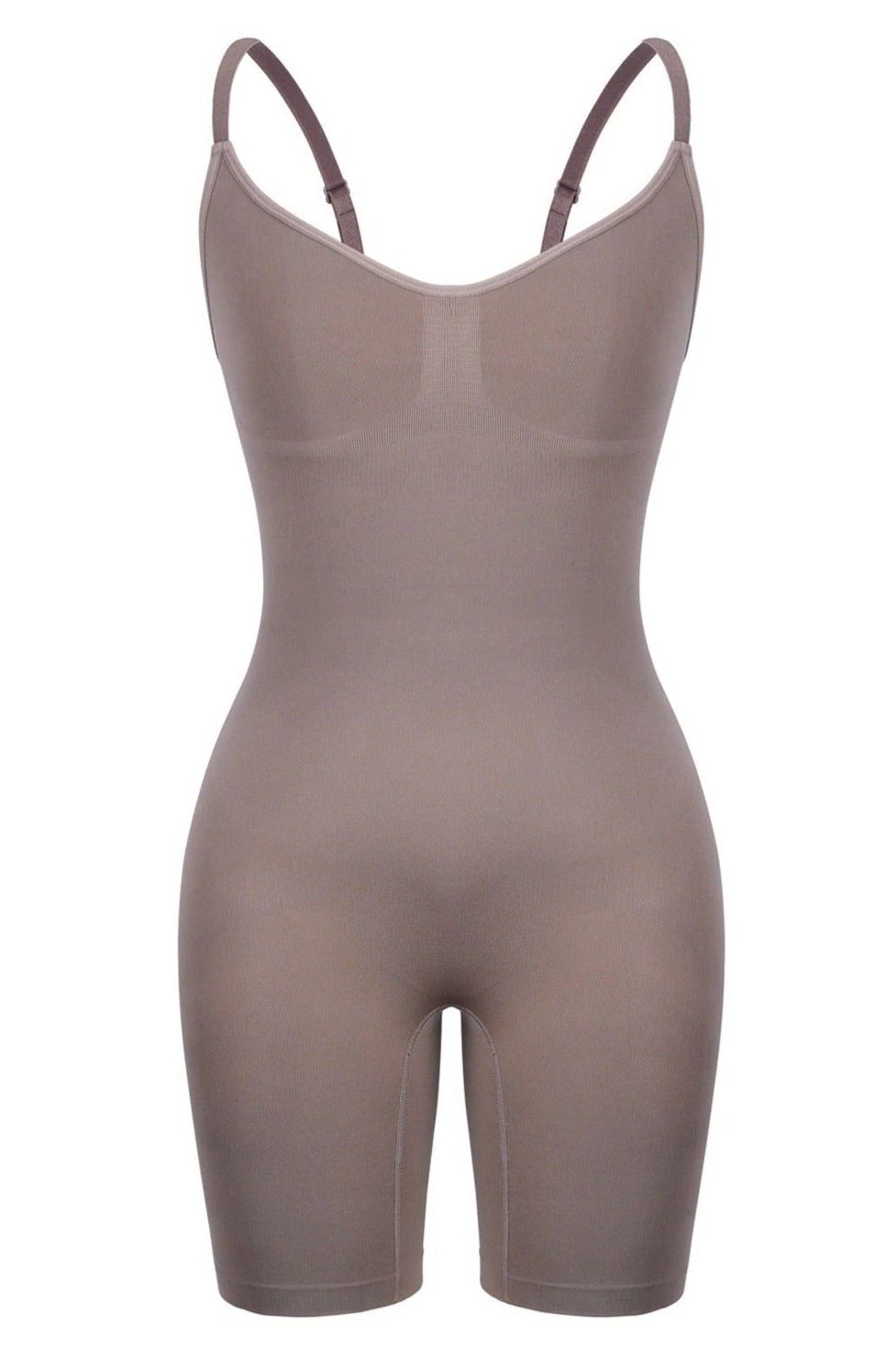 Woman wearing a figure flattering  Sculpting One Piece Bodysuit Shapewear - Mid Thigh Bodycon Collection