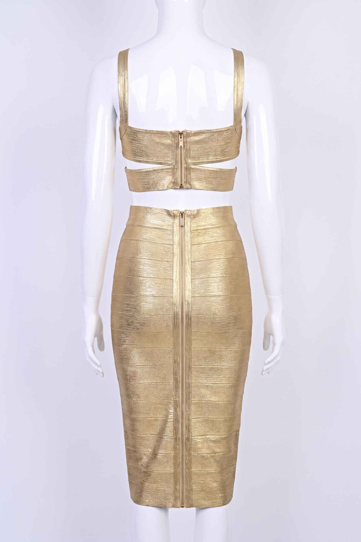 Woman wearing a figure flattering Selene Bandage Crop Top and Midi Skirt Set - Gold BODYCON COLLECTION Pty Ltd