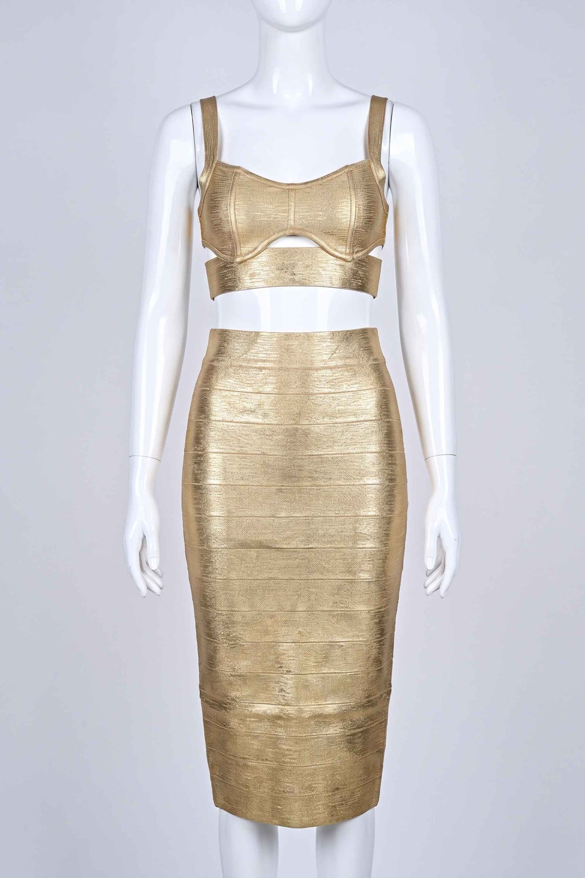 Woman wearing a figure flattering Selene Bandage Crop Top and Midi Skirt Set - Gold BODYCON COLLECTION Pty Ltd