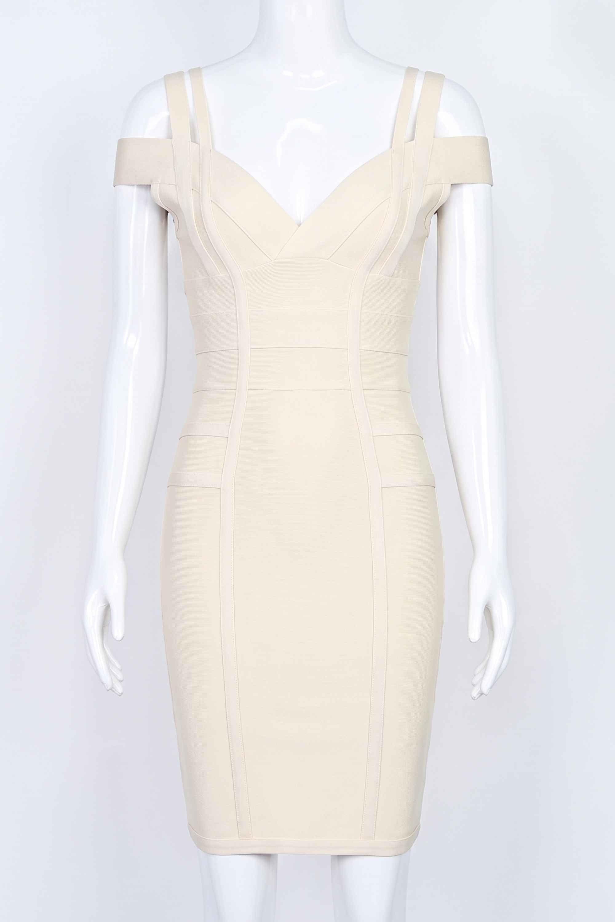 Woman wearing a figure flattering Sia Bandage Dress - Cream Bodycon Collection