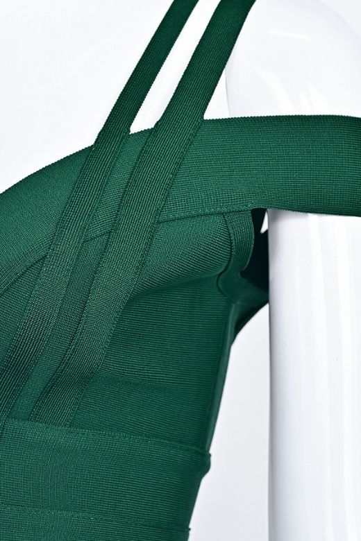 Woman wearing a figure flattering Sia Bandage Dress - Emerald Green Bodycon Collection