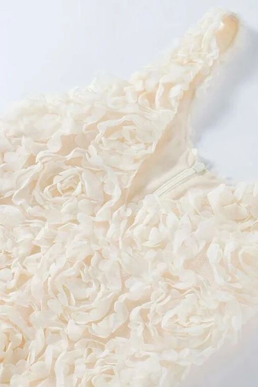 Woman wearing a figure flattering  Sonia Bodycon Mini Dress - White Pearl BODYCON COLLECTION