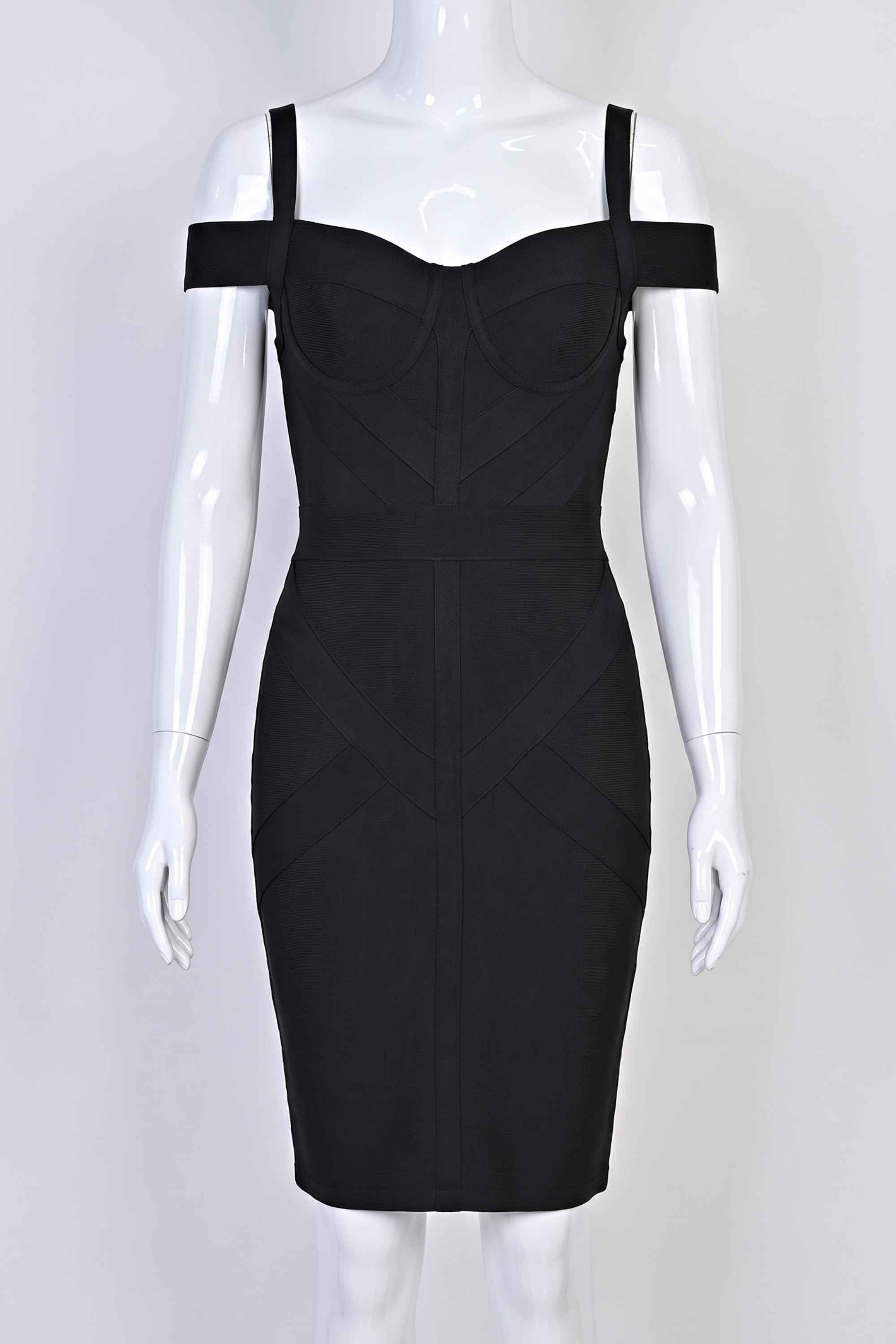 Woman wearing a figure flattering Sophia Bandage Dress - Classic Black Bodycon Collection