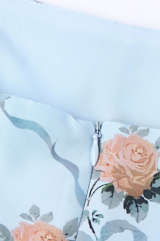 Woman wearing a figure flattering Tasmin Bodycon Midi Dress - Sky Blue BODYCON COLLECTION