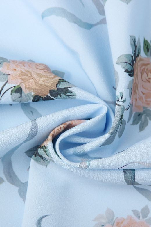 Woman wearing a figure flattering Tasmin Bodycon Midi Dress - Sky Blue BODYCON COLLECTION