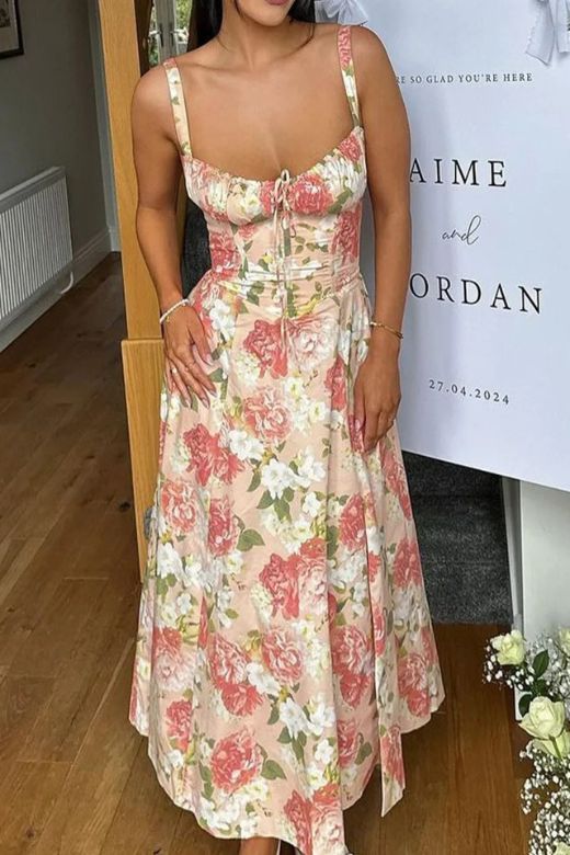 Woman wearing a figure flattering Taylor Bodycon Day Midi Dress - Salmon Pink BODYCON COLLECTION