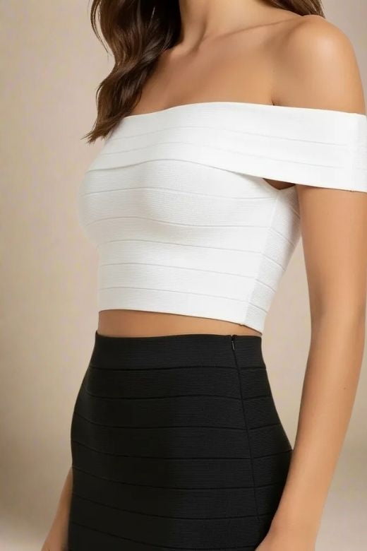 Woman wearing a figure flattering Vera Bandage Off Shoulder Top - White Pearl BODYCON COLLECTION Pty Ltd