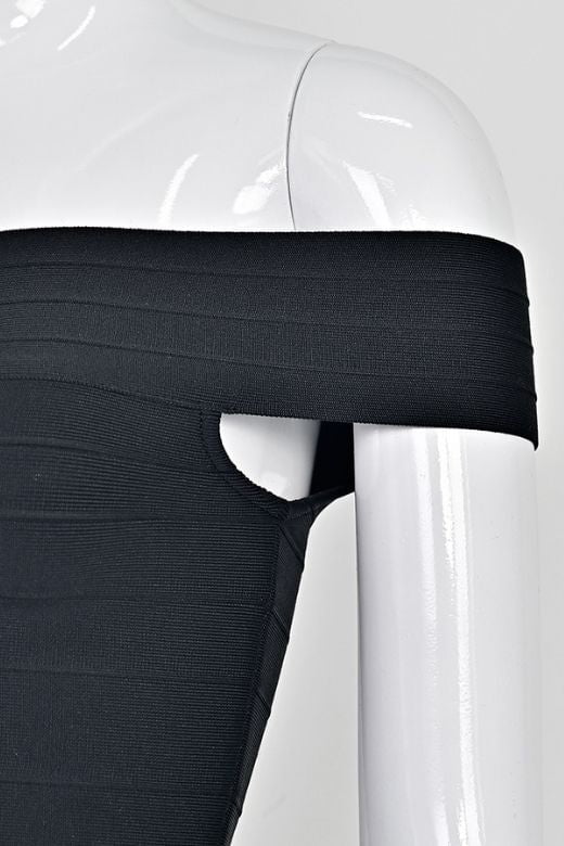 Woman wearing a figure flattering Vera Bandage Off Shoulder Top - White Pearl BODYCON COLLECTION Pty Ltd