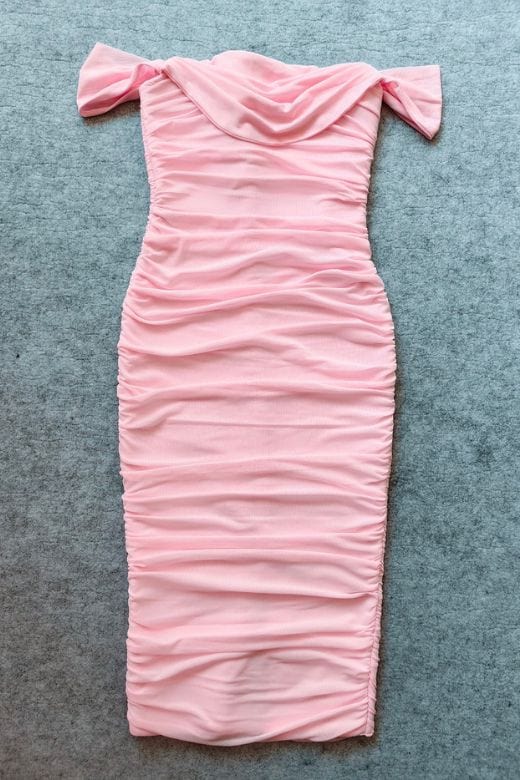 Woman wearing a figure flattering  Zia Bodycon Wrap Midi Dress - Dusty Pink Bodycon Collection