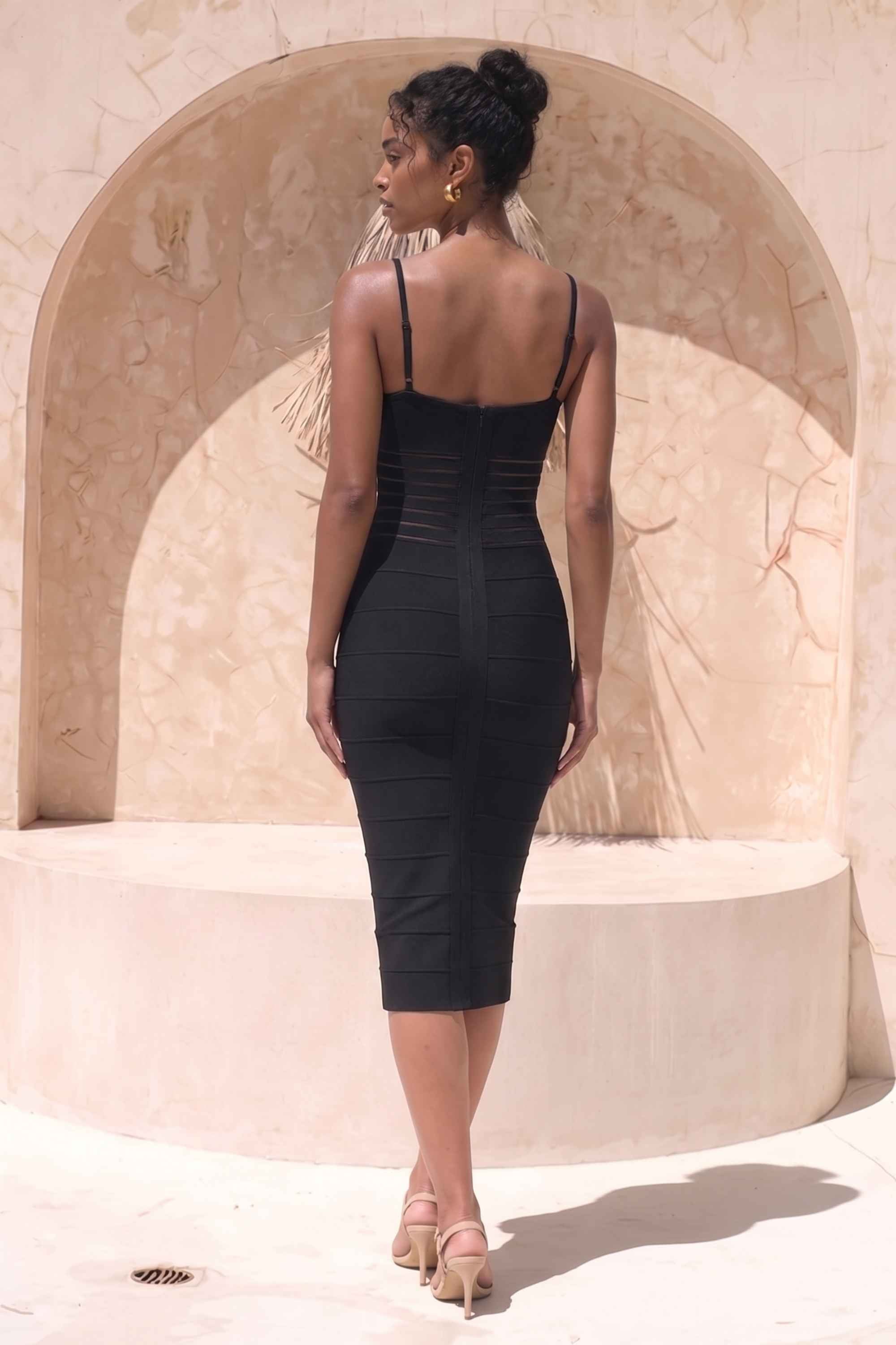 Woman wearing a figure flattering  Abigail Bodycon Midi Dress - Classic Black BODYCON COLLECTION Pty Ltd