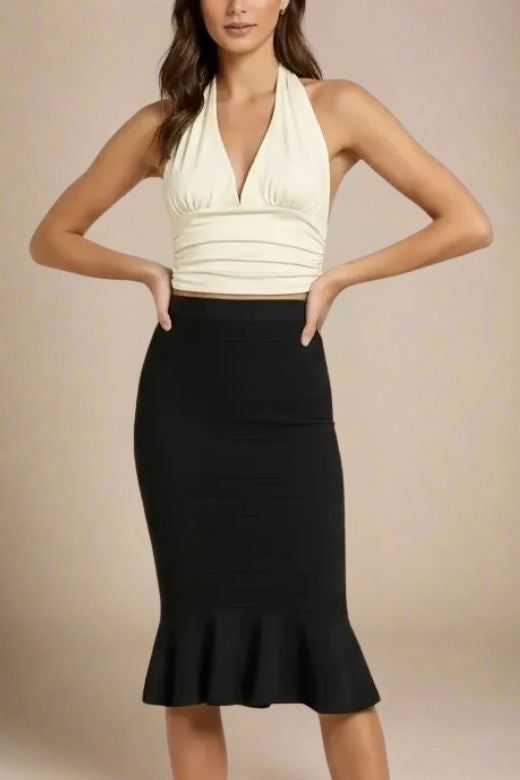 Woman wearing a figure flattering  Aby Halter Top - Butter Yellow BODYCON COLLECTION Pty Ltd