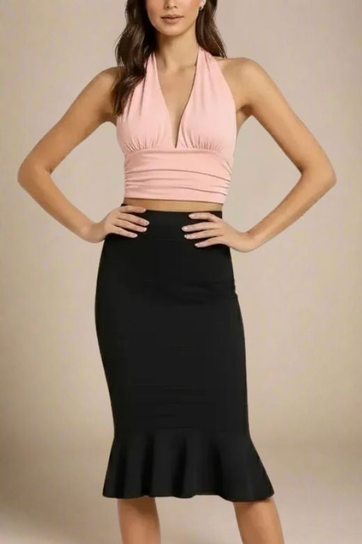 Woman wearing a figure flattering  Aby Halter Top - Pink Peach Fuzz BODYCON COLLECTION Pty Ltd