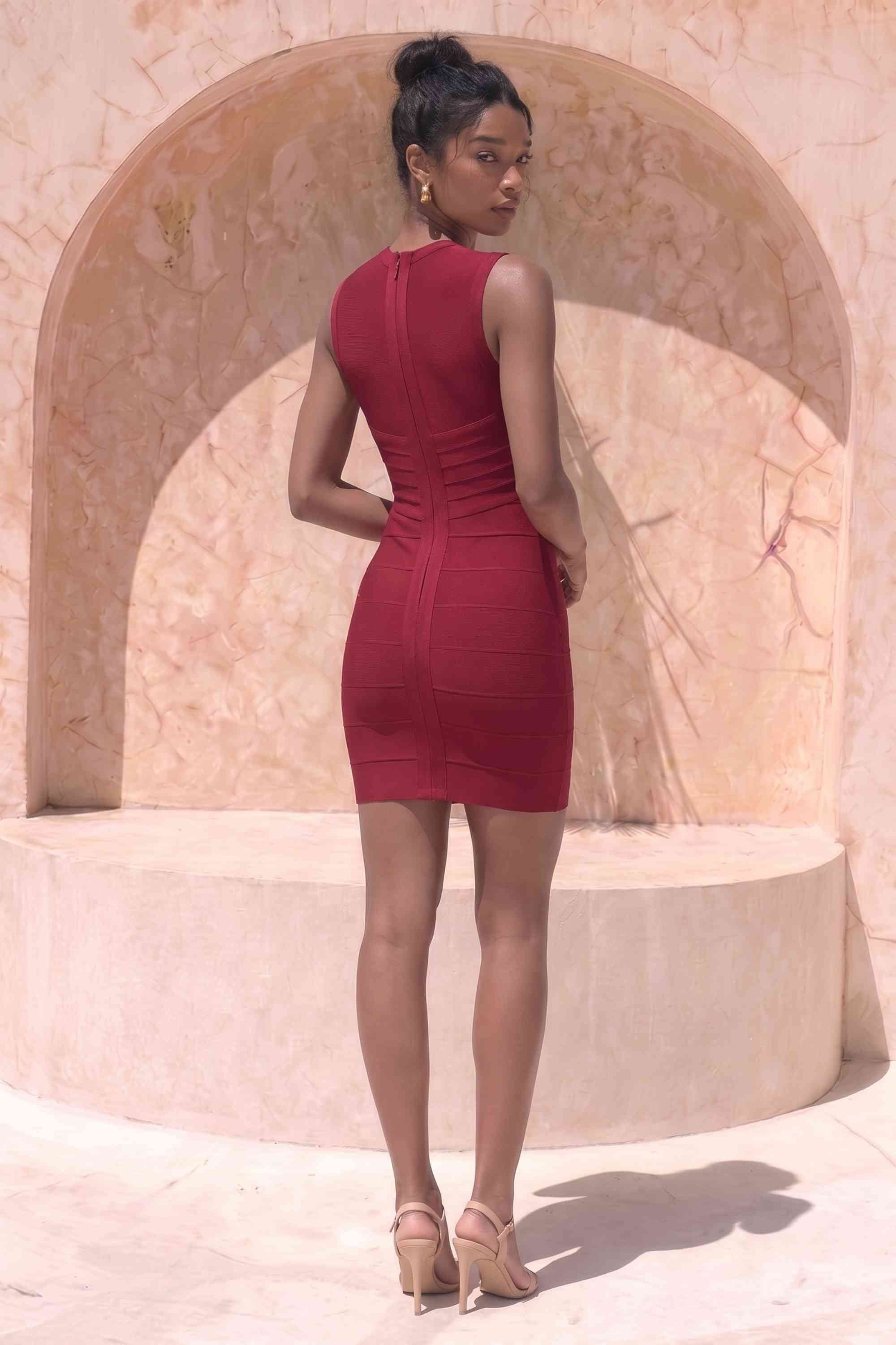 Woman wearing a figure flattering  Alora Bandage Mini Dress - Red Wine BODYCON COLLECTION Pty Ltd