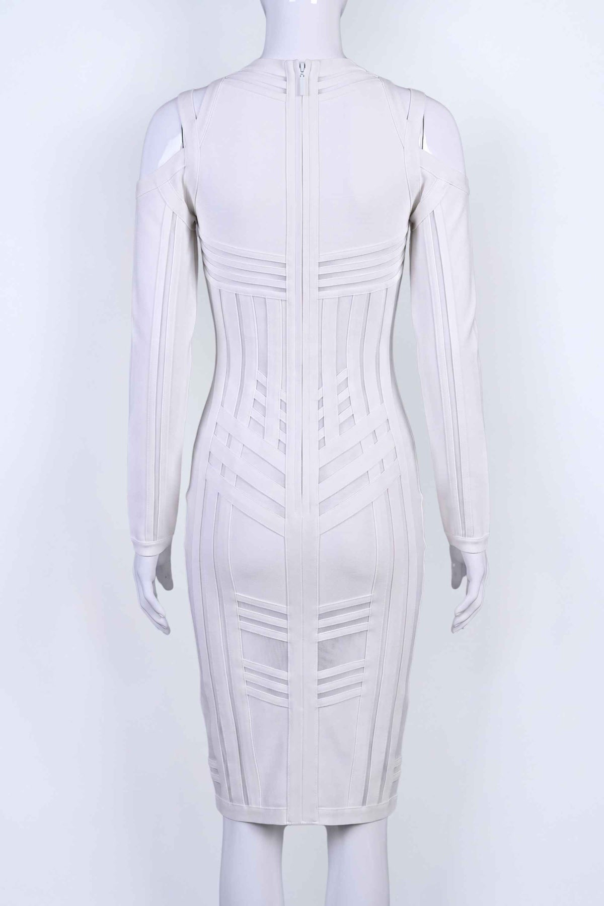 Woman wearing a figure flattering  Amelia Long Sleeve Bandage Dress - Pearl White BODYCON COLLECTION
