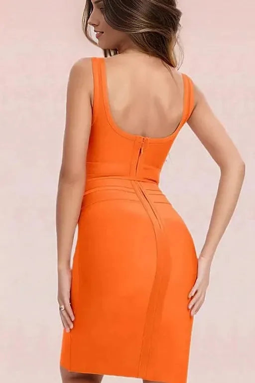 Woman wearing a figure flattering  Amy Bandage Dress - Apricot Orange Bodycon Collection
