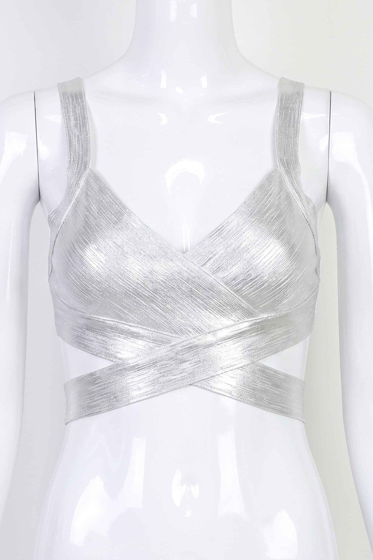 Woman wearing a figure flattering  Ang Bandage Crop Top - Silver BODYCON COLLECTION