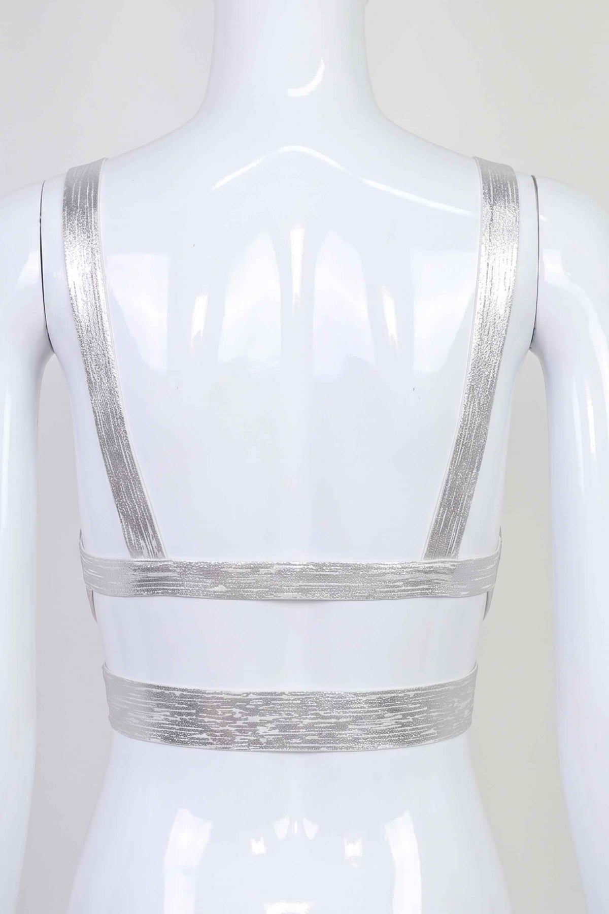 Woman wearing a figure flattering  Ang Bandage Crop Top - Silver BODYCON COLLECTION