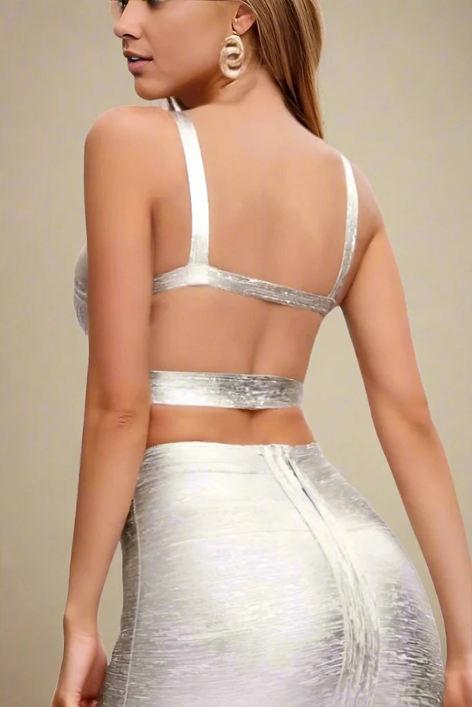 Woman wearing a figure flattering  Ang Bandage Crop Top - Silver BODYCON COLLECTION