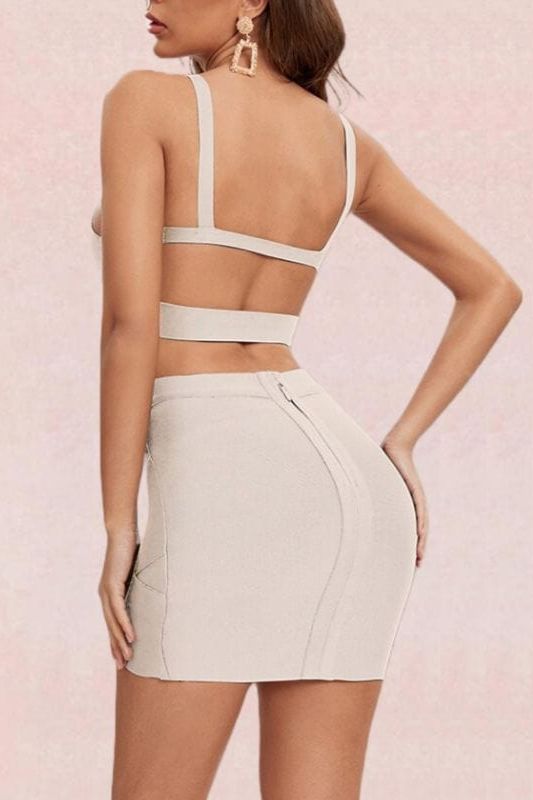Woman wearing a figure flattering  Ang Bandage Top and Mini Skirt Set - Cream BODYCON COLLECTION