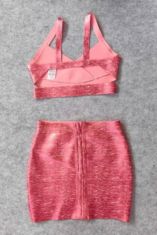 Woman wearing a figure flattering  Ang Bandage Top and Mini Skirt Set - Metallic Pink BODYCON COLLECTION