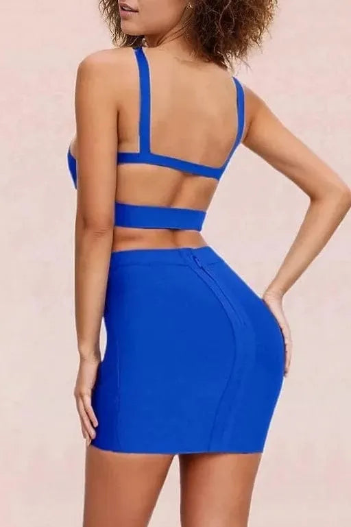 Woman wearing a figure flattering  Ang Bandage Top and Mini Skirt Set - Royal Blue BODYCON COLLECTION