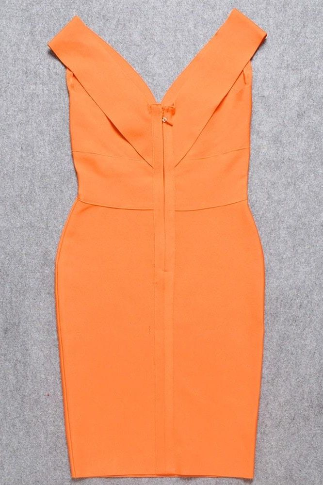 Woman wearing a figure flattering  Ash Bandage Dress - Apricot Orange Bodycon Collection