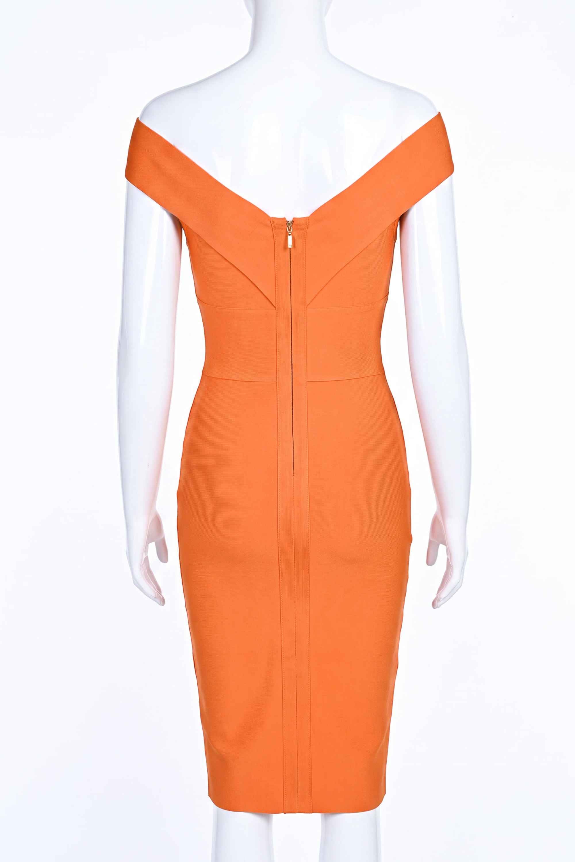 Woman wearing a figure flattering  Ash Bandage Dress - Apricot Orange Bodycon Collection