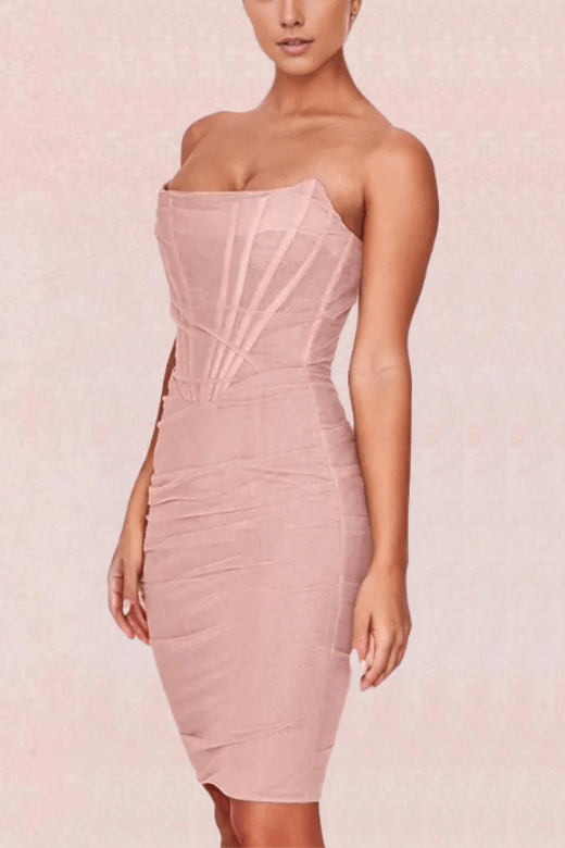 Woman wearing a figure flattering  Athena Bodycon Wrap Dress - Dusty Pink BODYCON COLLECTION