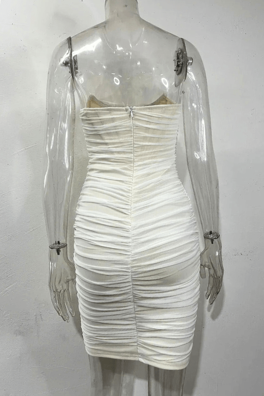 Woman wearing a figure flattering  Athena Bodycon Wrap Dress - Pearl White BODYCON COLLECTION