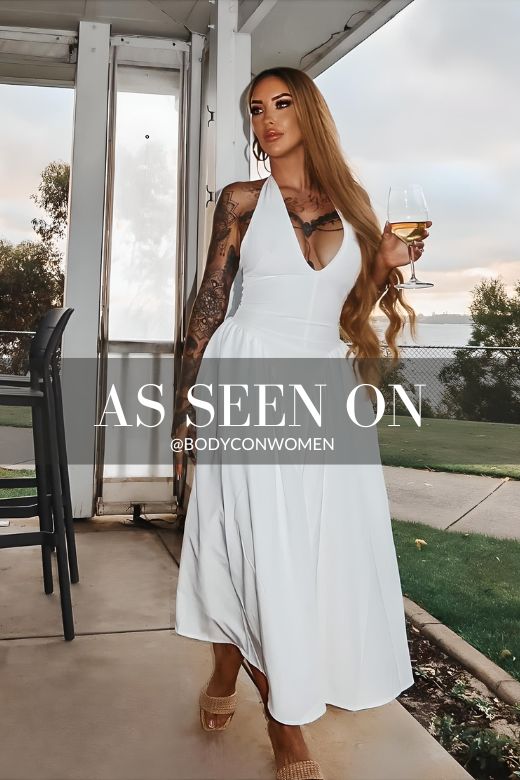 Woman wearing a figure flattering  Austen Bodycon Midi Dress - Pearl White BODYCON COLLECTION