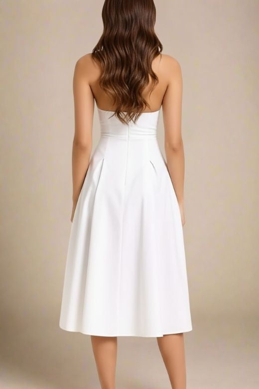 Woman wearing a figure flattering  Austen Bodycon Midi Dress - White Pearl BODYCON COLLECTION