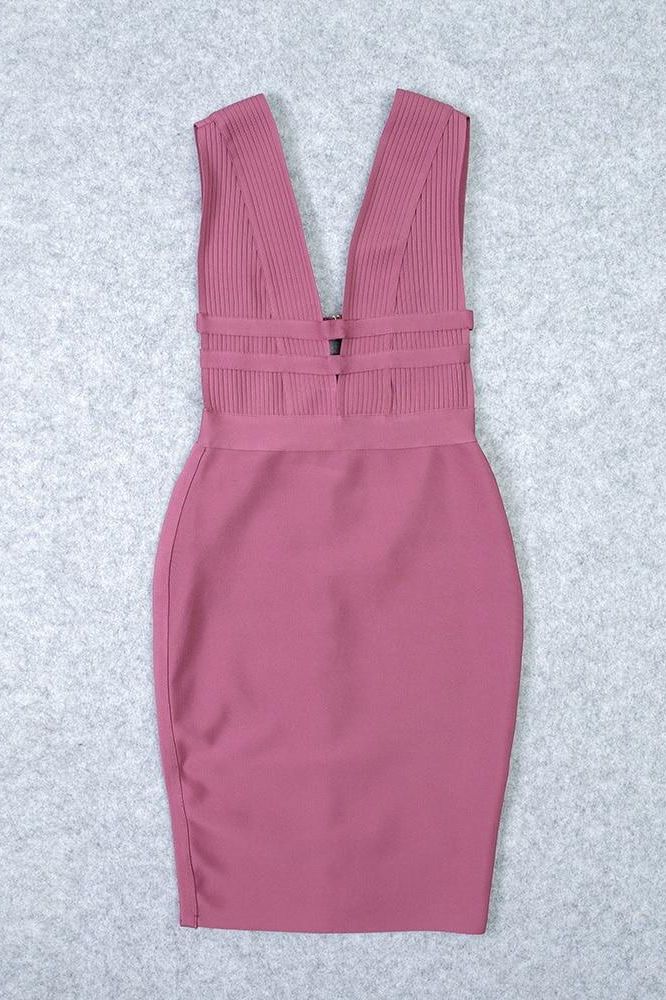 Woman wearing a figure flattering  Bay Bandage Dress - Ballet Pink Bodycon Collection
