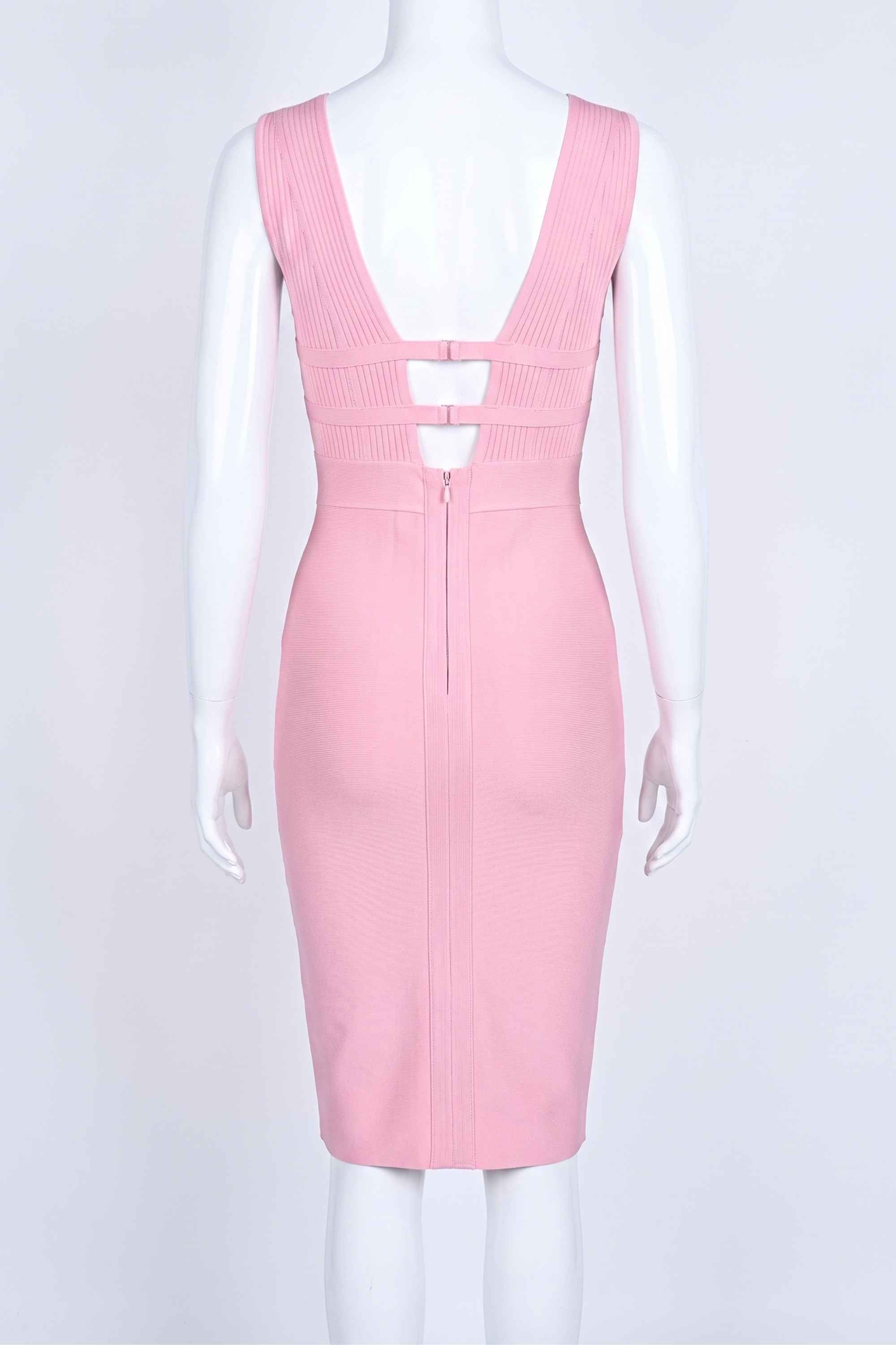 Woman wearing a figure flattering  Bay Bandage Dress - Blush Pink Bodycon Collection