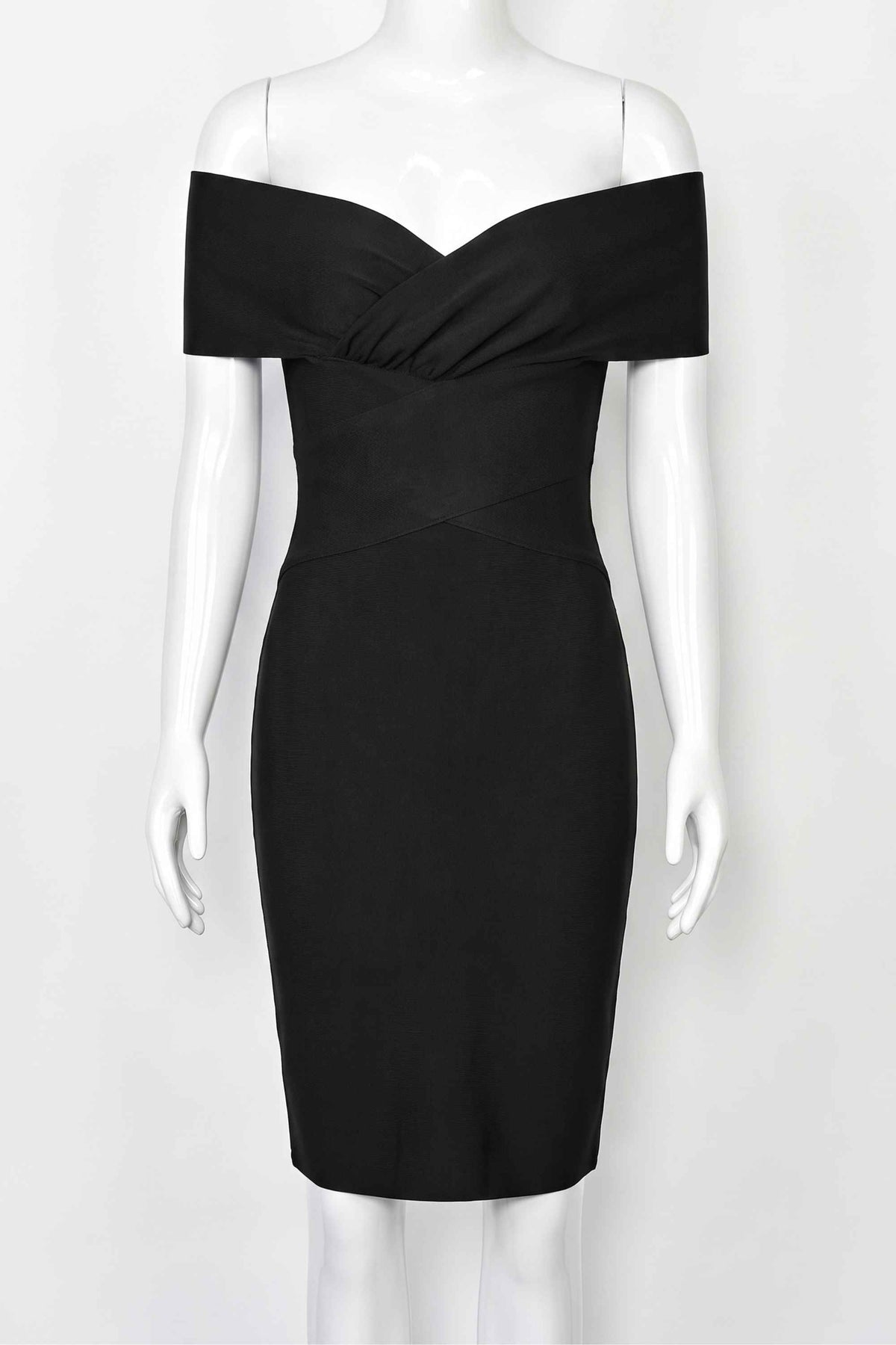 Woman wearing a figure flattering  Bea Bandage Dress - Classic Black Bodycon Collection