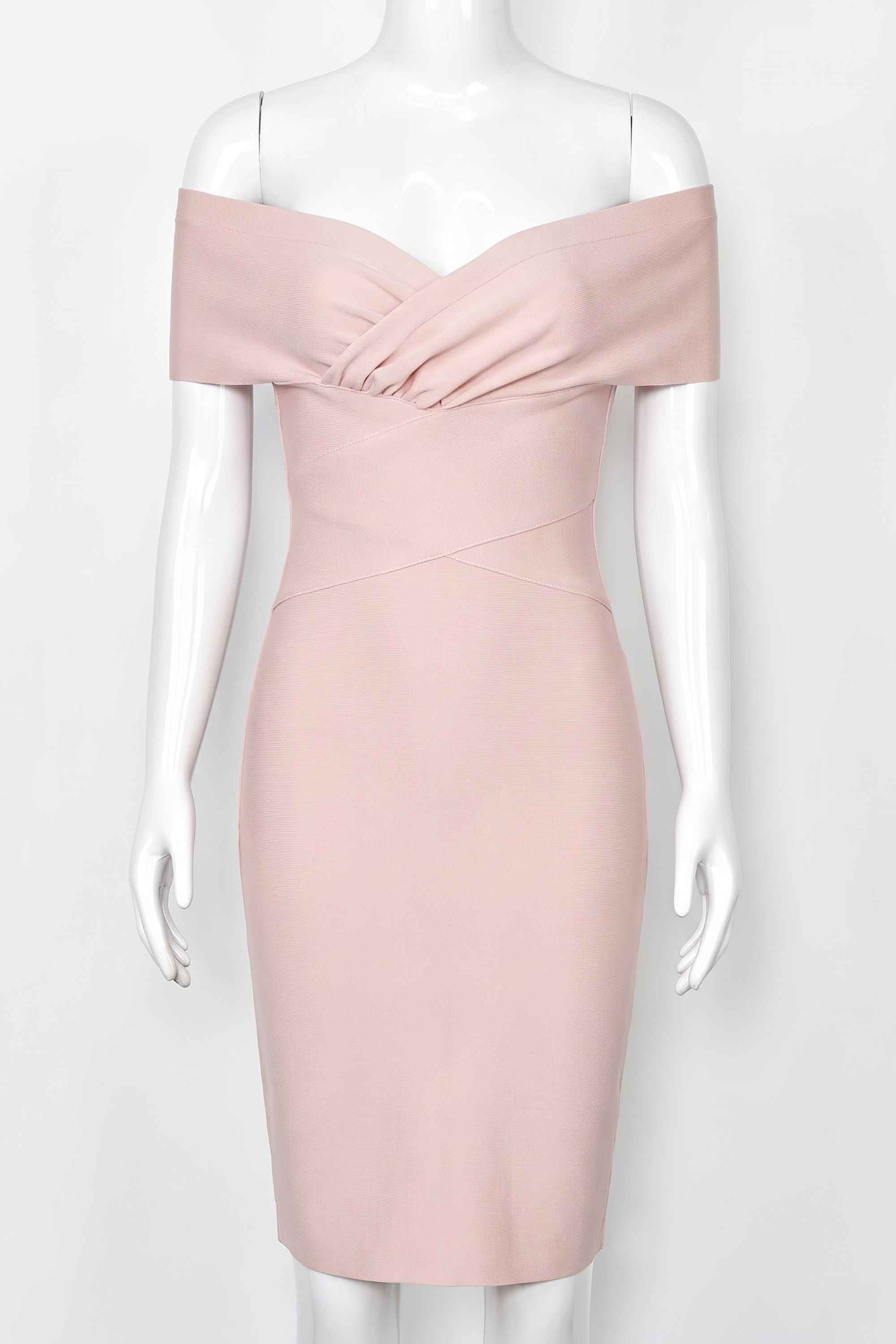Woman wearing a figure flattering  Bea Bandage Dress - Nude Bodycon Collection