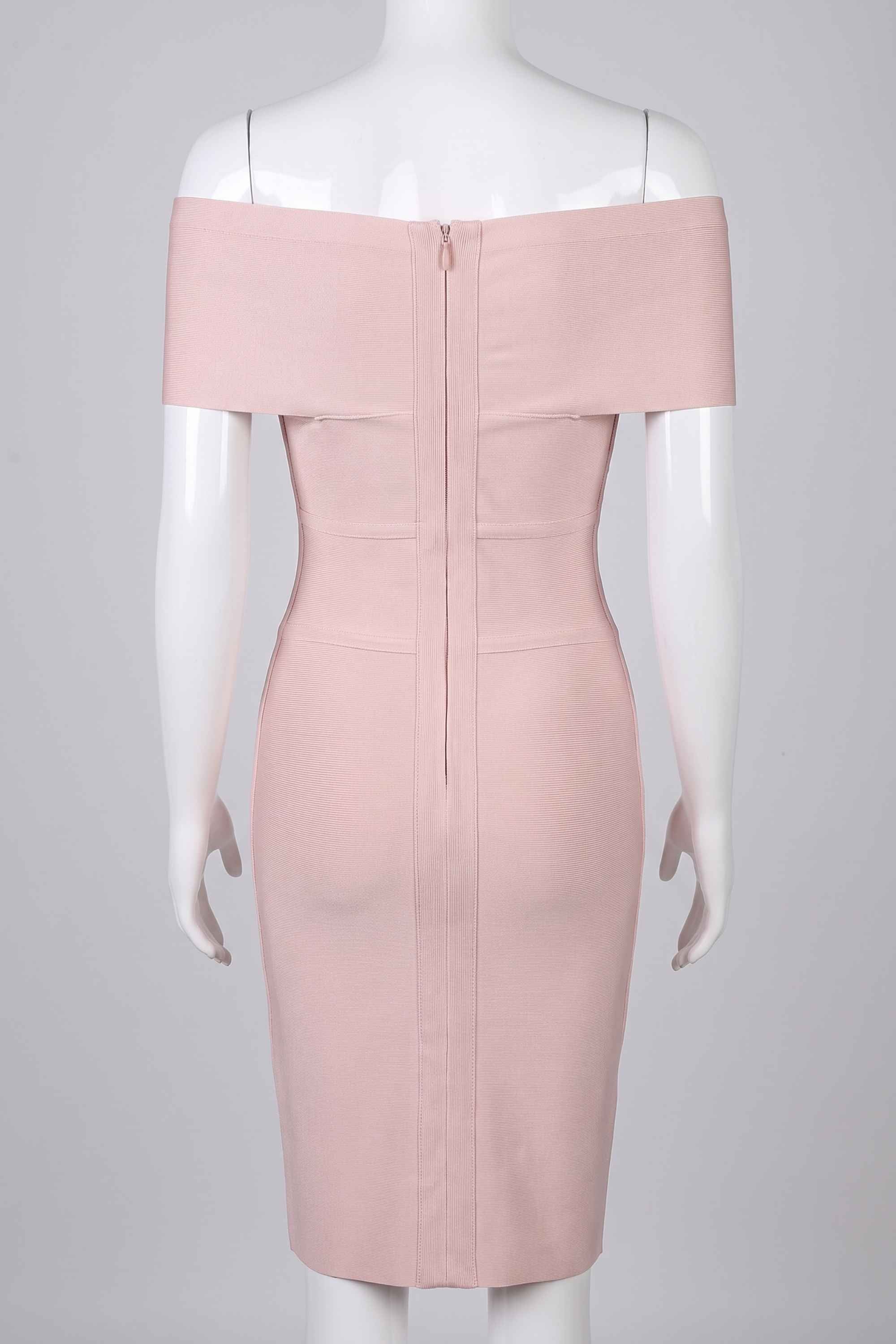 Woman wearing a figure flattering  Bea Bandage Dress - Nude Bodycon Collection