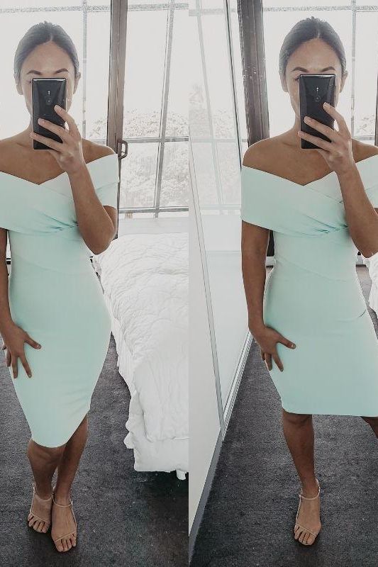 Woman wearing a figure flattering  Bea Bandage Dress - Pearl White Bodycon Collection