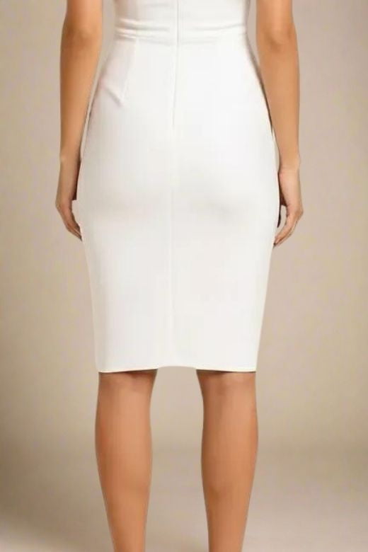 Woman wearing a figure flattering  Bea Bandage Dress - White Pearl Bodycon Collection