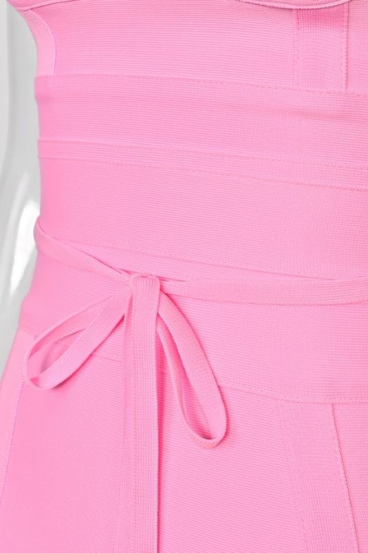 Woman wearing a figure flattering  Bek Bandage Dress - Blush Pink Bodycon Collection