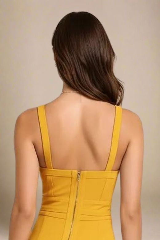 Woman wearing a figure flattering  Bek Bandage Dress - Mustard Yellow Bodycon Collection