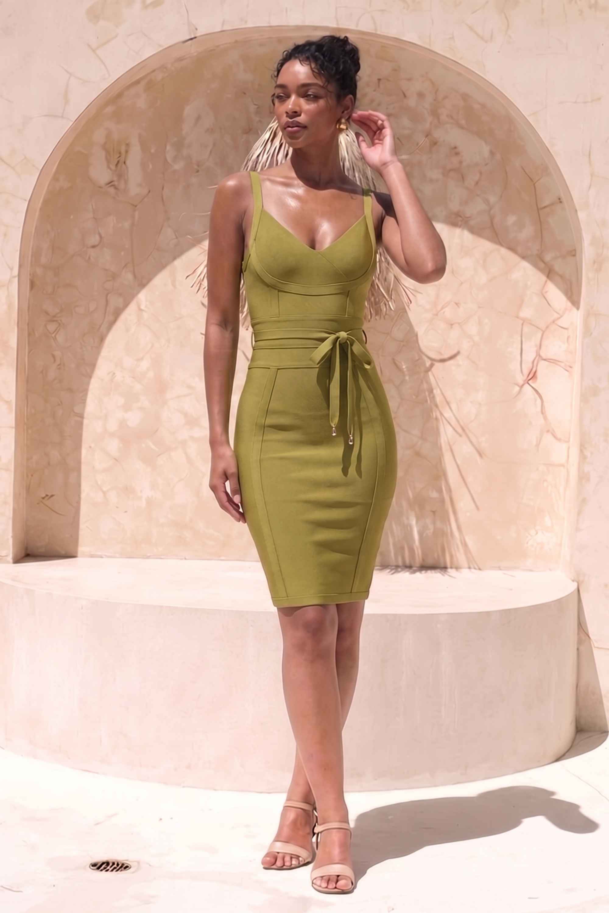 Woman wearing a figure flattering  Bek Bandage Dress - Olive Green Bodycon Collection