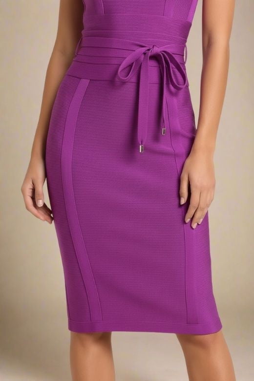 Woman wearing a figure flattering  Bek Bandage Dress - Plum Purple Bodycon Collection