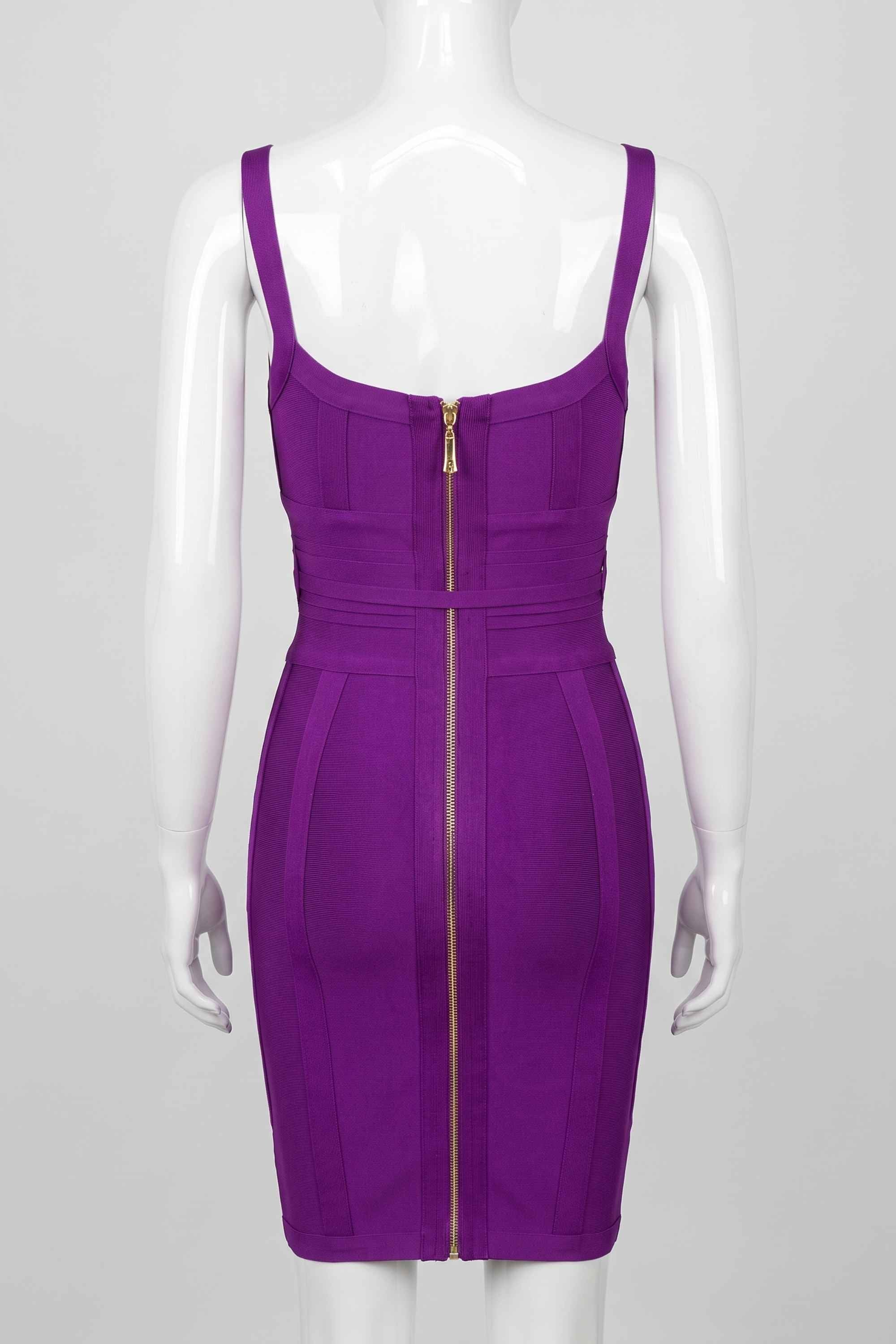 Woman wearing a figure flattering  Bek Bandage Dress - Plum Purple Bodycon Collection