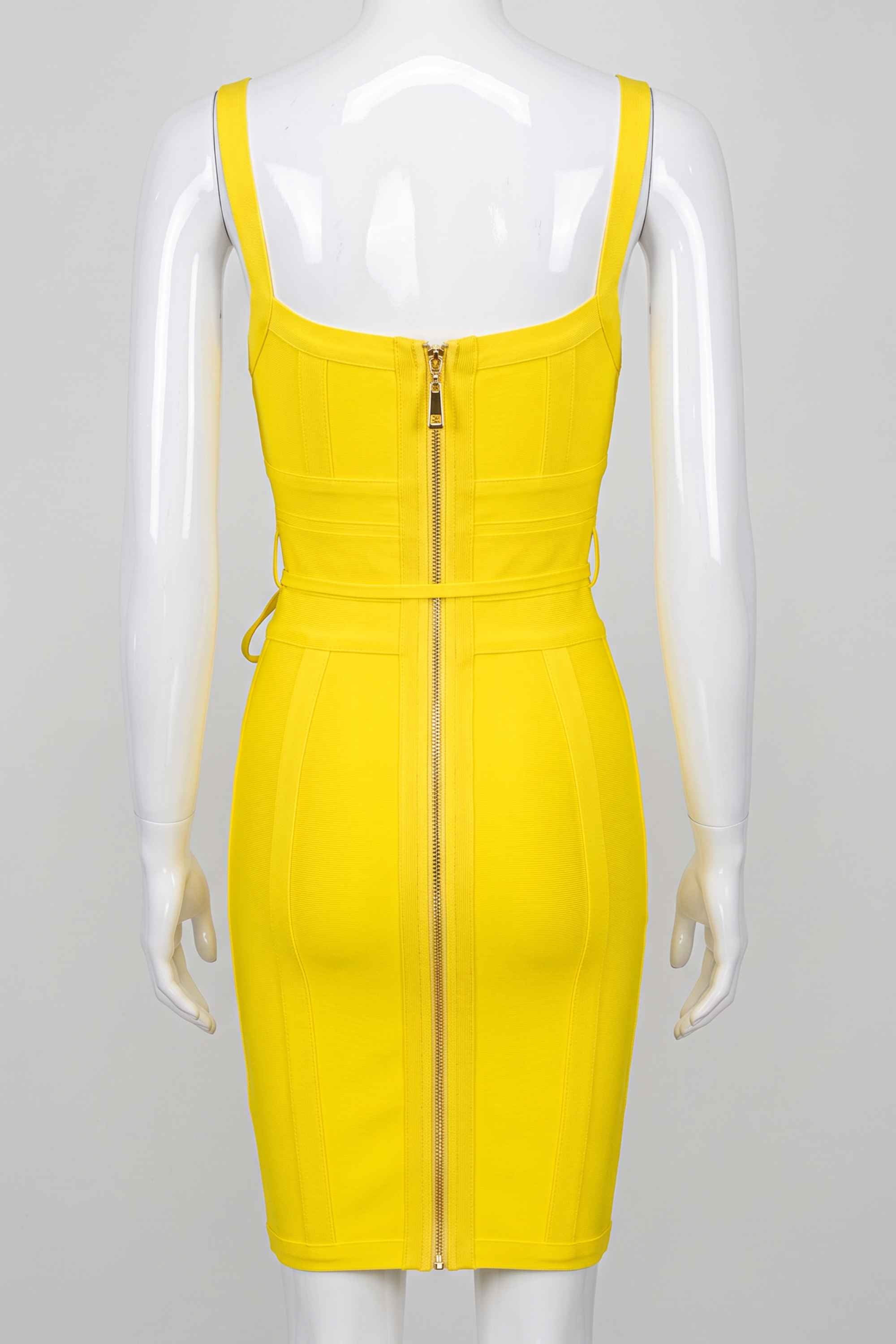 Woman wearing a figure flattering  Bek Bandage Dress - Sun Yellow Bodycon Collection