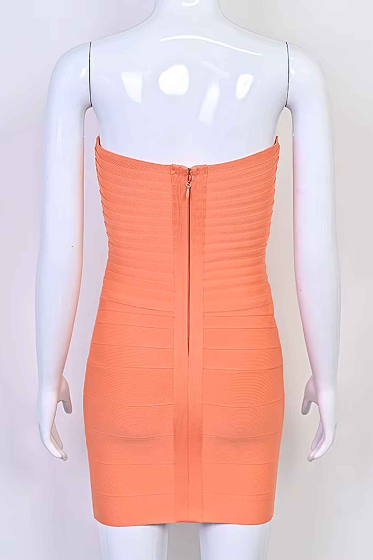Woman wearing a figure flattering  Belle Bandage Mini Dress - Coral BODYCON COLLECTION Pty Ltd
