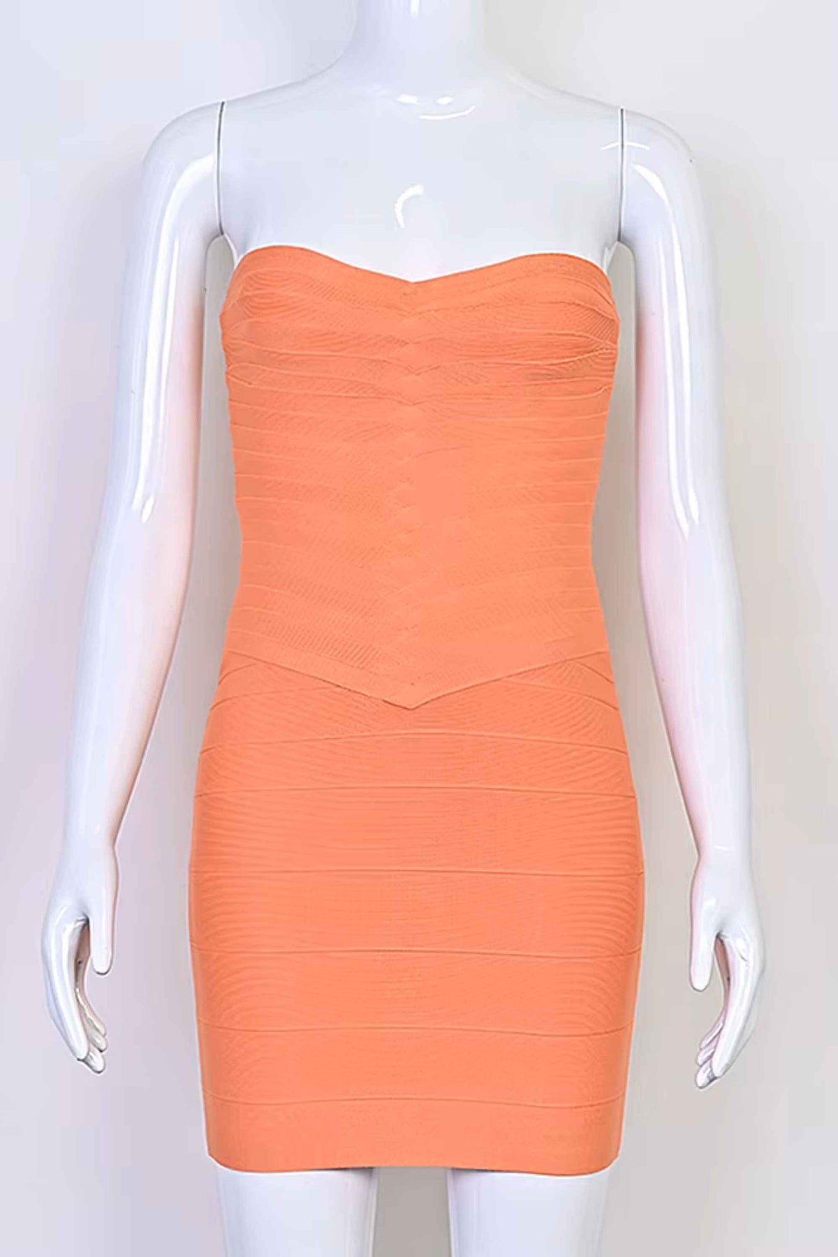 Woman wearing a figure flattering  Belle Bandage Mini Dress - Coral BODYCON COLLECTION Pty Ltd