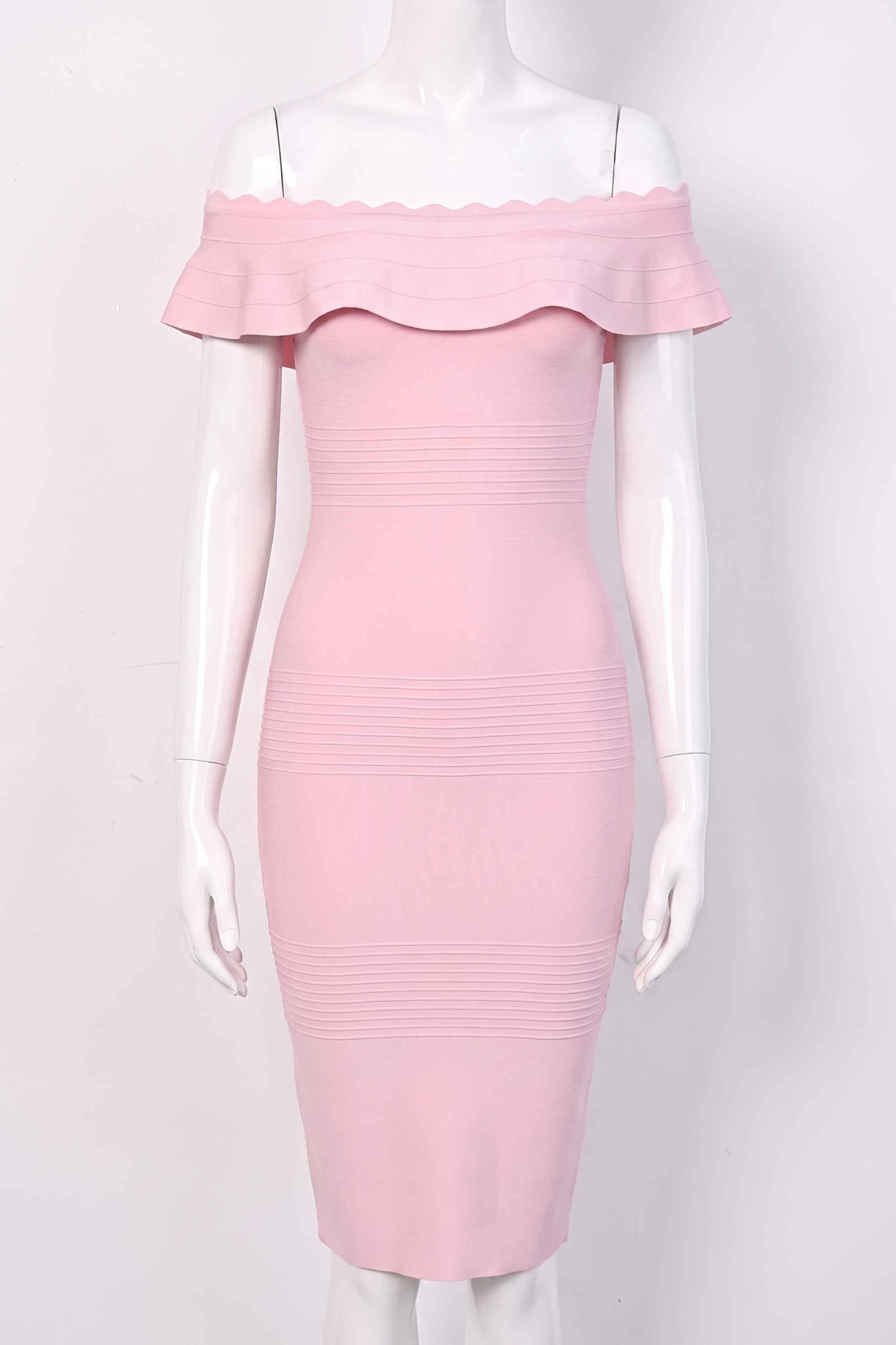 Woman wearing a figure flattering  Billie Bandage Midi Dress - Dusty Pink Bodycon Collection