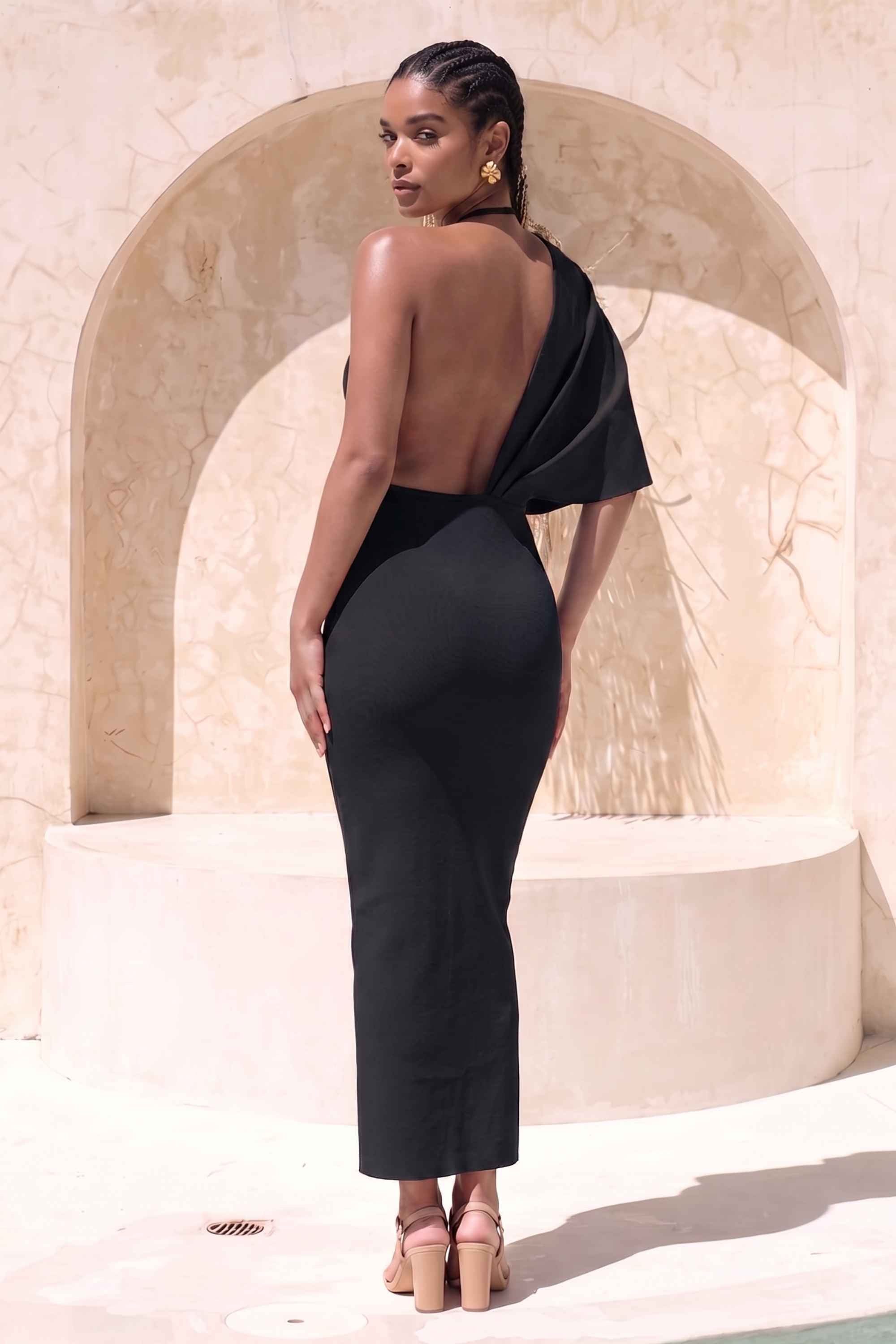 Woman wearing a figure flattering  Blake Bandage Maxi Dress - Classic Black BODYCON COLLECTION
