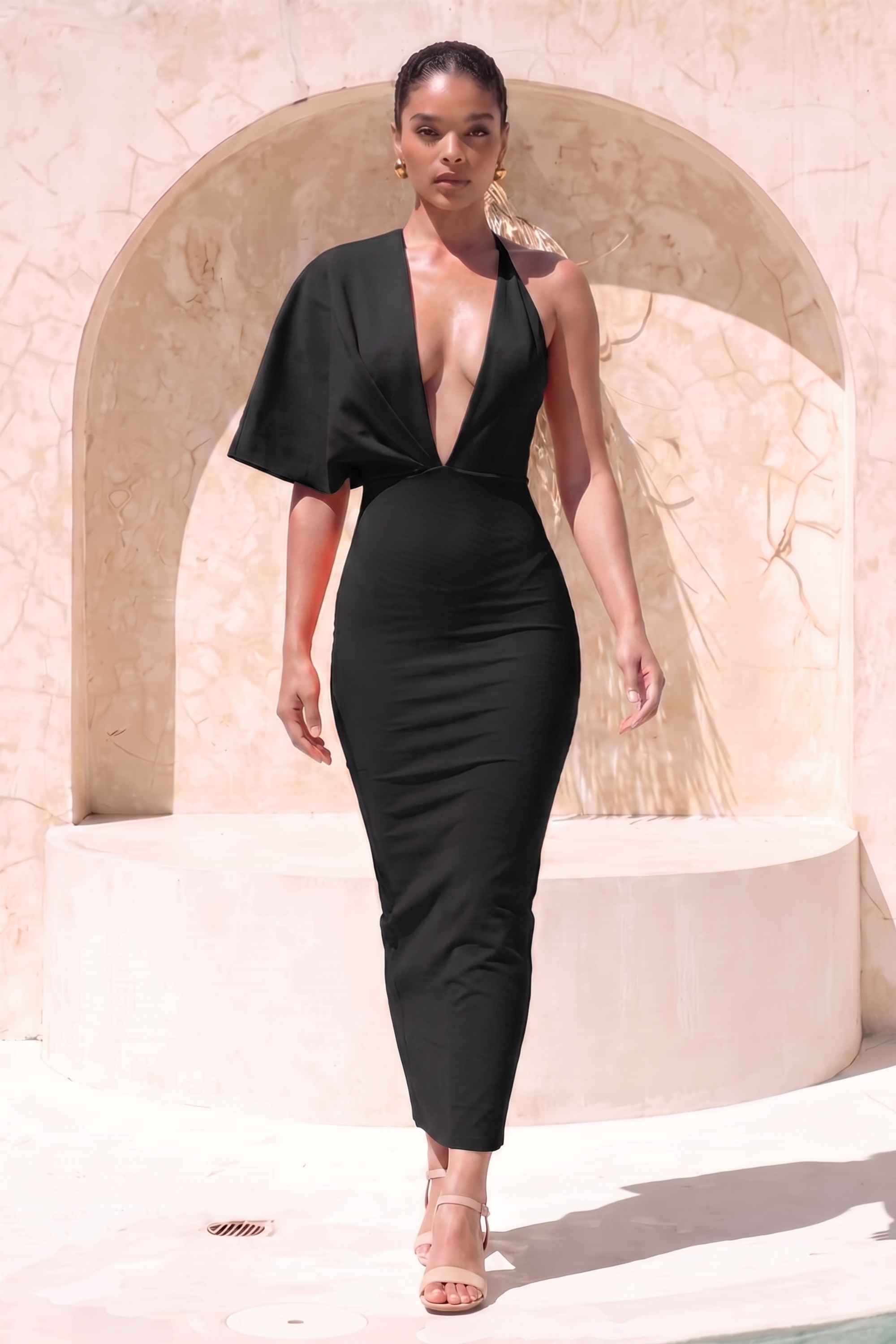 Woman wearing a figure flattering  Blake Bandage Maxi Dress - Classic Black BODYCON COLLECTION