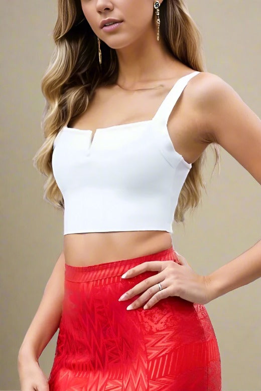 Woman wearing a figure flattering  Brooke Bandage Crop Top - Pearl White BODYCON COLLECTION
